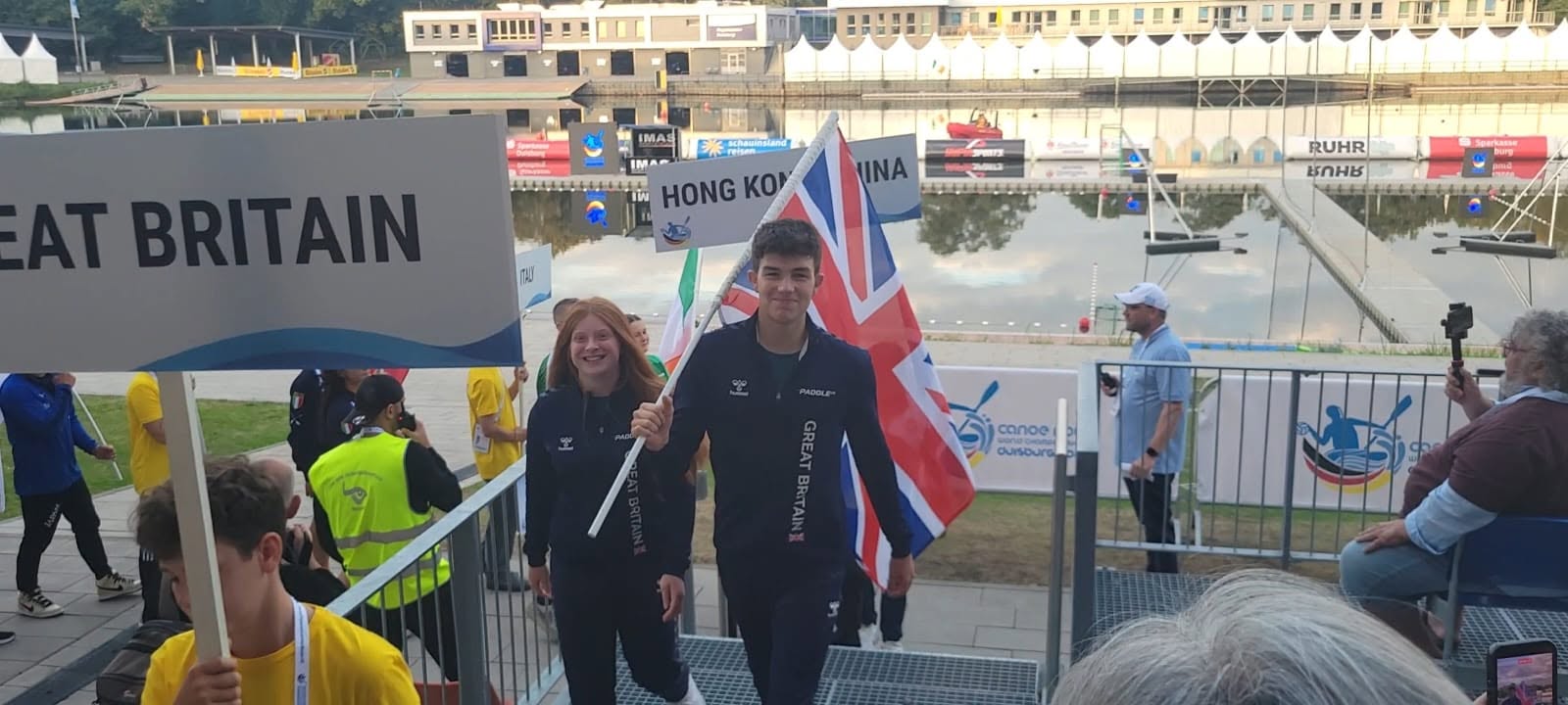 Cam holding the flag
