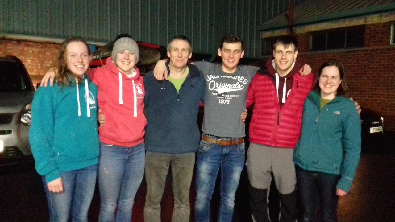 Six club members standing together for a group photograph.